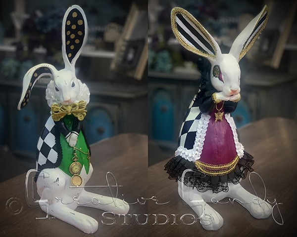 Whimsical Rabbit figures with painted on clothes in harlequin and check with embellishments